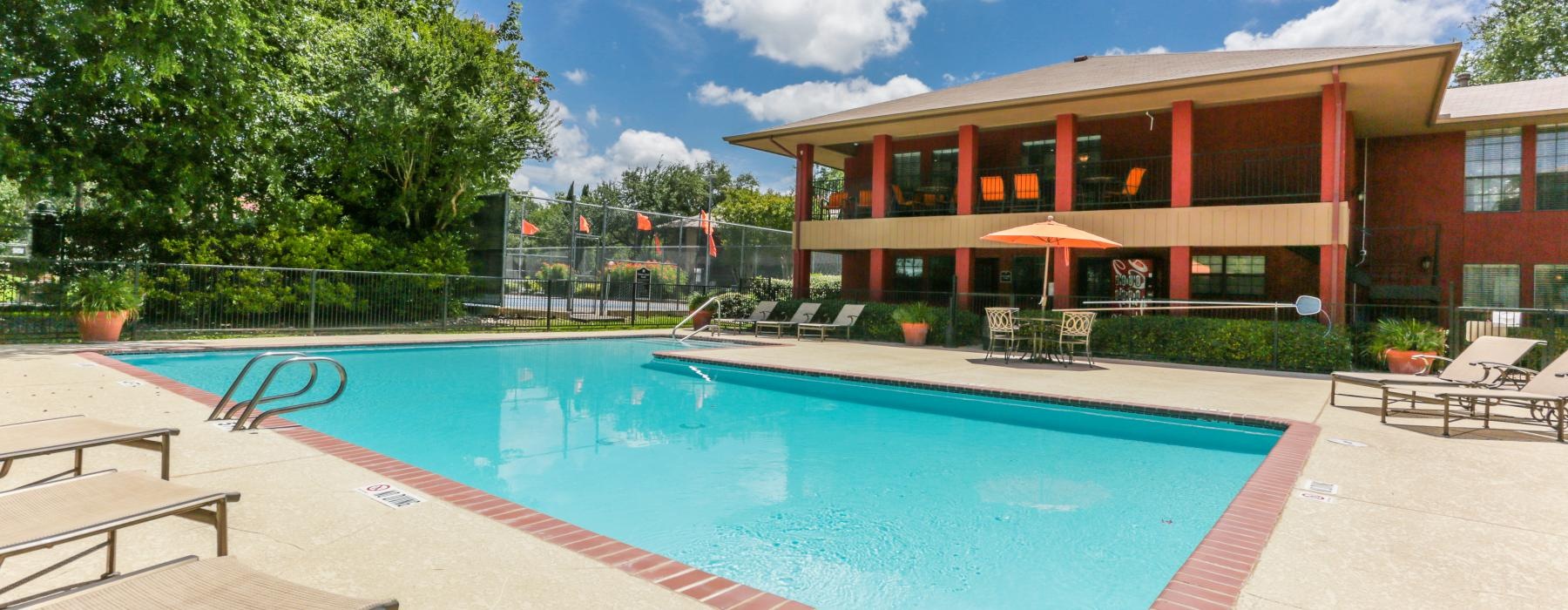 a swimming pool outside a building