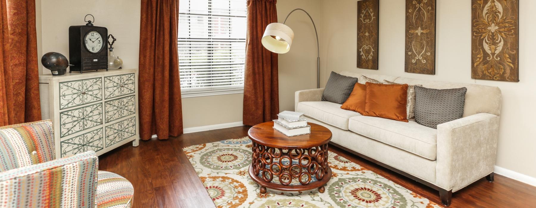 a living room with a couch and a table