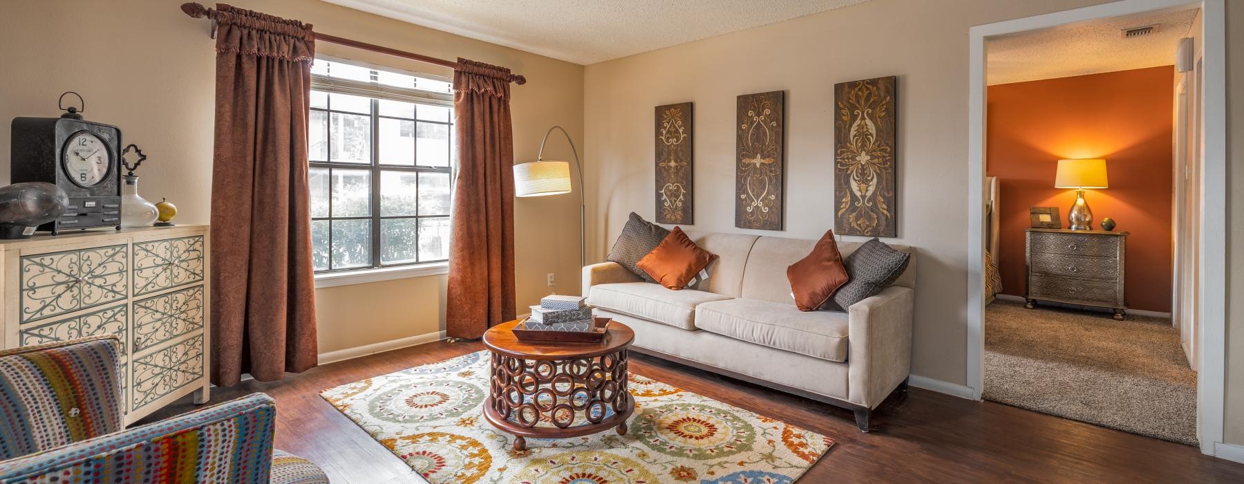 a living room with a couch and a table